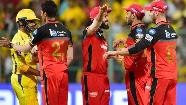 RCB Skipper Virat Kohli with team mates celebrate after his team won the match by 1 run. (PTI)