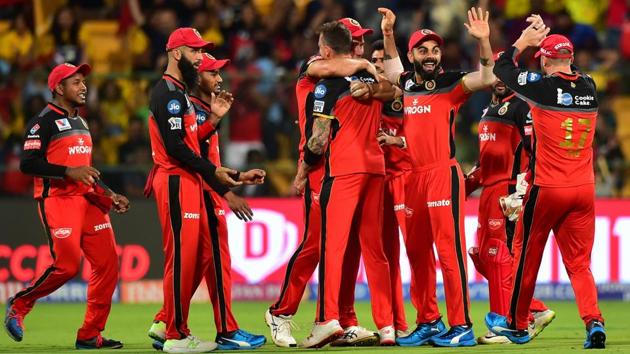RCB bowler Dale Steyn celebrate with team mates after taking the wicket of CSK batsman Shane Watson. (PTI)