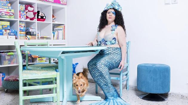 Inbar Ben Yakar, a member of the Israeli Mermaid Community at home in Kiryat Yam, Israel. It’s the Israeli pocket of a worldwide community that she claims is gaining prominence. “It was a crazy revelation,” said Katzenell. “I realized I was part of something big.” (Oded Balilty / AP)