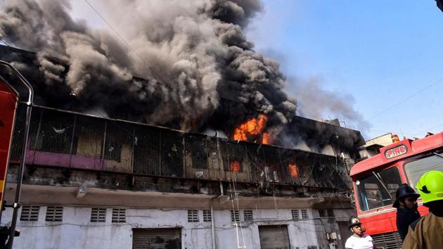 A massive fire broke out at a factory in Bhiwandi area of Maharashtra’s Thane district early on Monday as firefighters managed to control the blaze after five and a half hours. At least 40 workers were asleep on the terrace of a nearby under construction building when the building caught fire, officials said. The cause of the fire is yet to be ascertained and no casualties were reported. (PTI) A massive fire broke out at a factory in Bhiwandi area of Maharashtra’s Thane district early on Monday as firefighters managed to control the blaze after five and a half hours. At least 40 workers were asleep on the terrace of a nearby under construction building when the building caught fire, officials said. The cause of the fire is yet to be ascertained and no casualties were reported. (PTI)