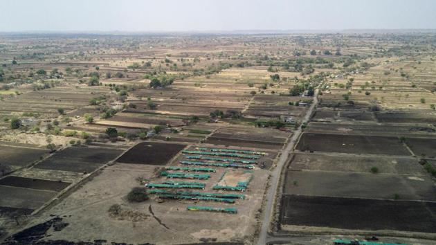 Farmland near the village of Khardewadi is seen in an aerial photograph taken in Beed district, Maharashtra. A three-year drought has left some farmers with no income to pay back loans, with tragic consequences: Beed reportedly has the state’s highest rate of farmer suicides. As many as 12,602 farmers and agricultural labourers in India committed suicide in 2015, according to the last available data before the government stopped releasing figures. (Dhiraj Singh / Bloomberg) Farmland near the village of Khardewadi is seen in an aerial photograph taken in Beed district, Maharashtra. A three-year drought has left some farmers with no income to pay back loans, with tragic consequences: Beed reportedly has the state’s highest rate of farmer suicides. As many as 12,602 farmers and agricultural labourers in India committed suicide in 2015, according to the last available data before the government stopped releasing figures. (Dhiraj Singh / Bloomberg)