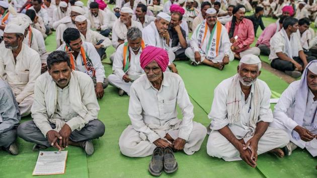 People attend a National Congress Party rally in Beed. Large-scale farmer protests have popped up across India, with a contingent from Beed joining more than 50,000 who marched to New Delhi last November. Mumbai has also seen thousands of farmers from Maharashtra jam up roads over the past few years to protest the Modi government’s farm policies. (Dhiraj Singh / Bloomberg) People attend a National Congress Party rally in Beed. Large-scale farmer protests have popped up across India, with a contingent from Beed joining more than 50,000 who marched to New Delhi last November. Mumbai has also seen thousands of farmers from Maharashtra jam up roads over the past few years to protest the Modi government’s farm policies. (Dhiraj Singh / Bloomberg)
