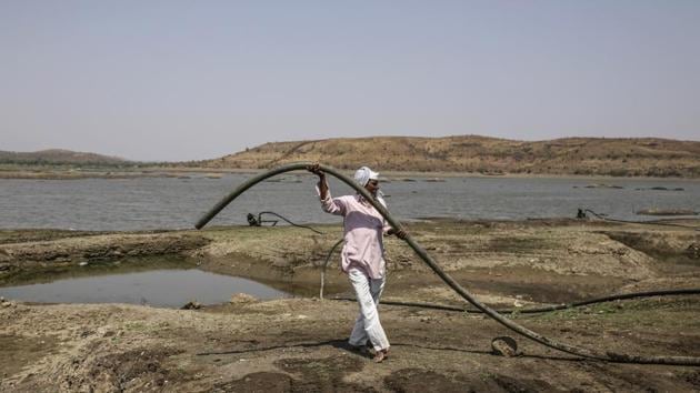 Despite the project many remain dry, prompting residents to seek alternatives. Bhaskar Sukhwasi, 60, helps run one of six diesel generators used to pump water into tankers from one of the few remaining reservoirs in Beed, which are then delivered to 57 villages in the district. He is supposed to be paid 150 rupees a day but says he hasn’t received wages for months. (Dhiraj Singh / Bloomberg) Despite the project many remain dry, prompting residents to seek alternatives. Bhaskar Sukhwasi, 60, helps run one of six diesel generators used to pump water into tankers from one of the few remaining reservoirs in Beed, which are then delivered to 57 villages in the district. He is supposed to be paid 150 rupees a day but says he hasn’t received wages for months. (Dhiraj Singh / Bloomberg)