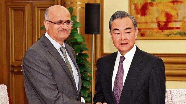 Indian foreign secretary Vijay Keshav Gokhale (left) and Chinese foreign minister Wang Yi at Zhongnanhai in Beijing on Monday. (AP) Indian foreign secretary Vijay Keshav Gokhale (left) and Chinese foreign minister Wang Yi at Zhongnanhai in Beijing on Monday. (AP)