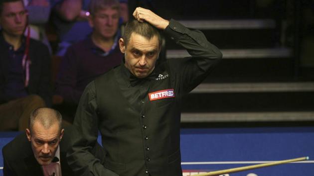 England's Ronnie O'Sullivan scratches his head as he plays during day four of the 2019 World Snooker Championship at The Crucible, Sheffield, England, Tuesday April 23, 2019. (Nigel French/PA via AP)(AP) England's Ronnie O'Sullivan scratches his head as he plays during day four of the 2019 World Snooker Championship at The Crucible, Sheffield, England, Tuesday April 23, 2019. (Nigel French/PA via AP)(AP)