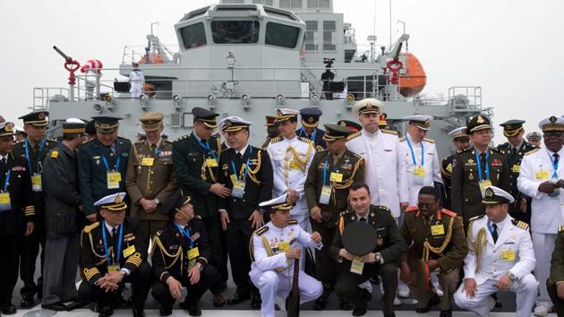 Foreign naval officers gather for a group photo on the deck of the naval training ship Qi Jiguang before a naval parade to commemorate the 70th anniversary of the founding of China's PLA Navy in the sea near Qingdao in the eastern China's Shandong province on April 23, 2019. (AFP photo) Foreign naval officers gather for a group photo on the deck of the naval training ship Qi Jiguang before a naval parade to commemorate the 70th anniversary of the founding of China's PLA Navy in the sea near Qingdao in the eastern China's Shandong province on April 23, 2019. (AFP photo)