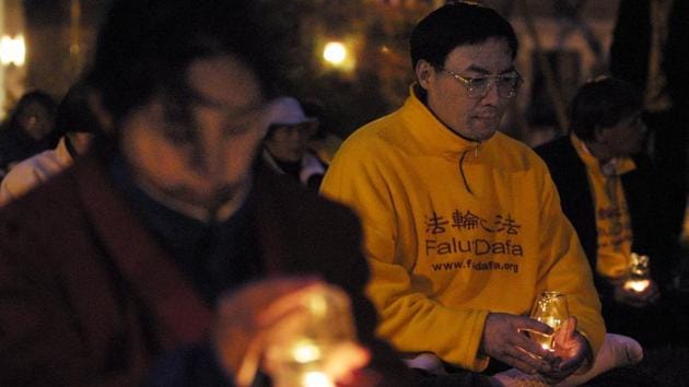 Practitioners on April 17, 2001 during a vigil outside the Chinese Embassy in Washington. Beijing’s efforts to eliminate Falungong and other groups it deems heretical show no sign of abating, with dedicated “cult prevention and handling” departments active around the country. More than 900 Falungong followers were sentenced to prison between January 2013 and June 2016, according to a 2017 report by US-based Freedom House. (Alex Wong / Getty Images)