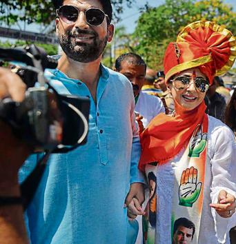 Often spotted in a colourful cotton kurta, Mohsin walks long distances at rallies across the constituency, as Urmila campaigns in an open vehicle (AFP) Often spotted in a colourful cotton kurta, Mohsin walks long distances at rallies across the constituency, as Urmila campaigns in an open vehicle (AFP)