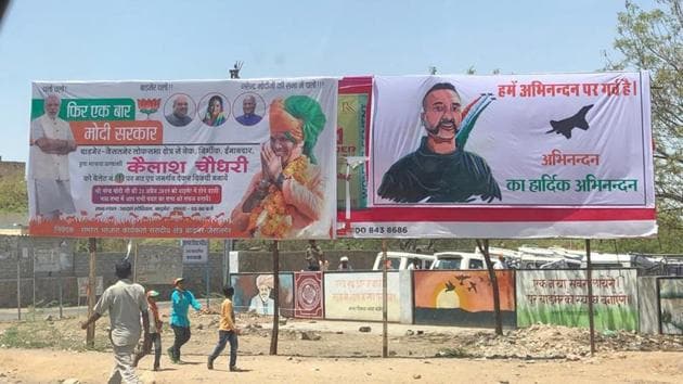 A poster of Wing Commander Abhinandan Varthaman put up prior to rally of Prime Minister Narendra Modi in Barmer(HT)