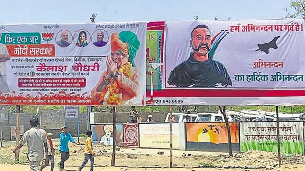 A poster of Wing Commander Abhinandan Varthaman put up before the rally of Prime Minister Narendra Modi in Barmer, Sunday April 21, 2019.(HT Photo)