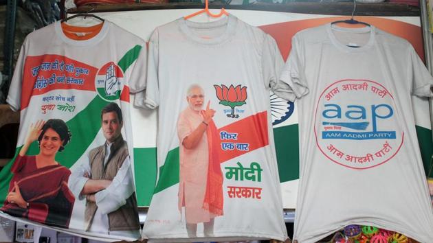 Branding of different political parties can be seen on t-shirts in Delhi’s Sadar Bazar.(Photo: Shivam Saxena/Hindustan Times)