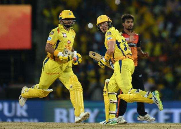Chennai Super Kings cricketer Shane Watson (R) Suresh Raina (L) run between wickets during the 2019 Indian Premier League (IPL) Twenty20 cricket match between Chennai Super Kings and Sunrisers Hyderabad at the M.A. Chidhambaram Stadium in Chennai. (AFP)