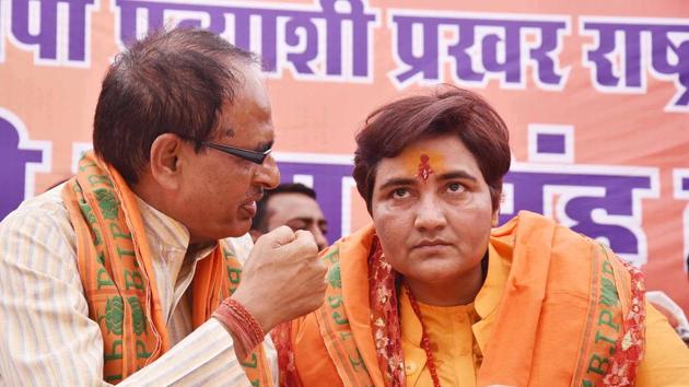 BJP candidate for Bhopal Lok Sabha constituency, Sadhvi Pragya Singh Thakur, with BJP national vice president Shivraj Singh Chouhan at a meeting before filing her nomination paper for elections, Bhopal, April 25(ANI)