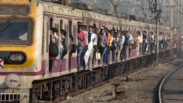 Several passengers were stranded inside trains and on platforms due to the technical snag. Many were confused as there was no announcement about when the services would resume.(HT PHOTO)