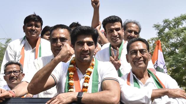 Boxer and Congress candidate from South Delhi constituency Vijender Singh during a road show before filing his nomination ahead of the Lok Sabha elections, at DC office, Saket, in New Delhi, on Tuesday, April 23, 2019. (Sanjeev Verma/HT PHOTO) Boxer and Congress candidate from South Delhi constituency Vijender Singh during a road show before filing his nomination ahead of the Lok Sabha elections, at DC office, Saket, in New Delhi, on Tuesday, April 23, 2019. (Sanjeev Verma/HT PHOTO)