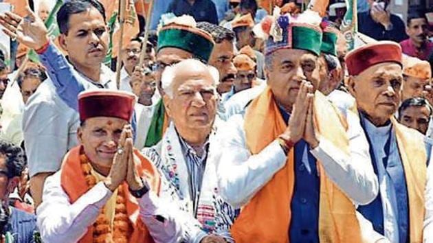 From left) BJP candidate Ram Sawroop Sharma, former Union minister Shanta Kumar, CM Jai Ram Thakur, former CM Prem Kumar Dhumal at a rally in Mandi on Wednesday, April 24, 2019.