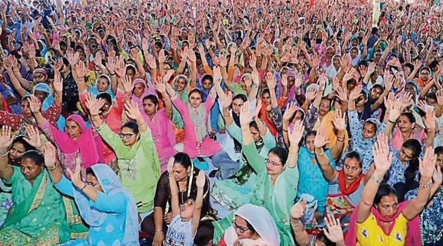 Followers of Dera Sacha Sauda at a recently-held congregation in Patiala.(HT Photo)