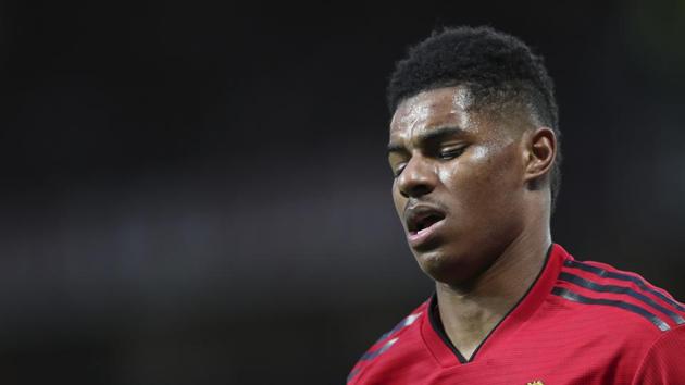 Manchester United's Marcus Rashford reacts after a clash during the English Premier League soccer match between Manchester United and Manchester City at Old Trafford Stadium in Manchester, England, Wednesday April 24, 201(AP)