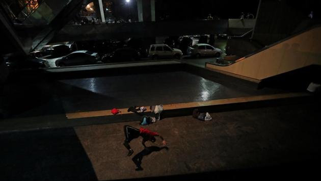 Yeafersonth Manrique whose nickname is B-Boy Chispa practices break dancing at the Teresa Carreno theatre area where he meets friends to dance in Caracas. "When we're out here dancing, we don't think about the state of the country," said Manrique, a 24-year-old drenched in sweat after a long practice. "In this world there is no crisis." (Ivan Alvarado / REUTERS) Yeafersonth Manrique whose nickname is B-Boy Chispa practices break dancing at the Teresa Carreno theatre area where he meets friends to dance in Caracas. "When we're out here dancing, we don't think about the state of the country," said Manrique, a 24-year-old drenched in sweat after a long practice. "In this world there is no crisis." (Ivan Alvarado / REUTERS)