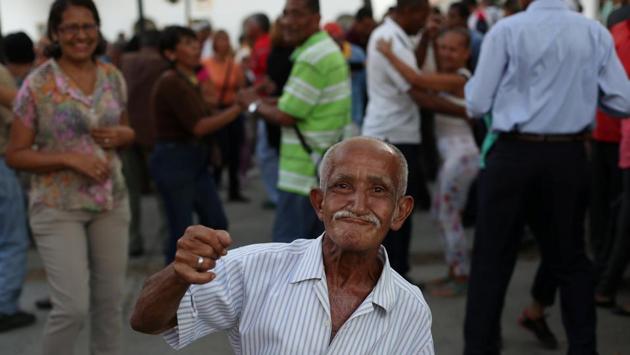Carmelo Gonzalez dances salsa at El Venezolano square where he meets a seniors club every Friday, Saturday and Sunday afternoon in Caracas. Gonzalez said, "I have fun and I work. The pension helps me a bit. You have to enjoy life, after you die there is nothing else." (Ivan Alvarado / REUTERS) Carmelo Gonzalez dances salsa at El Venezolano square where he meets a seniors club every Friday, Saturday and Sunday afternoon in Caracas. Gonzalez said, "I have fun and I work. The pension helps me a bit. You have to enjoy life, after you die there is nothing else." (Ivan Alvarado / REUTERS)