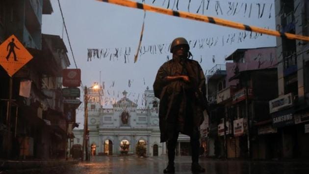 A soldier stands guard at St. Anthony's Shrine during heavy rain, days after a string of suicide bomb attacks on churches and luxury hotels across the island on Easter Sunday, in Colombo (Reuters) A soldier stands guard at St. Anthony's Shrine during heavy rain, days after a string of suicide bomb attacks on churches and luxury hotels across the island on Easter Sunday, in Colombo (Reuters)