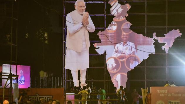 A cutout of Prime Minister Narendra Modi seen at Dashashwamedh Ghat in Varanasi, from where he is contesting Lok Sabha polls. (PTI) A cutout of Prime Minister Narendra Modi seen at Dashashwamedh Ghat in Varanasi, from where he is contesting Lok Sabha polls. (PTI)