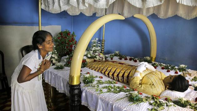Harshani Sriyani weeps over the body of her daughter who was killed in the Easter Sunday bombings in Colombo, Sri Lanka. (Eranga Jayawardena / AP) Harshani Sriyani weeps over the body of her daughter who was killed in the Easter Sunday bombings in Colombo, Sri Lanka. (Eranga Jayawardena / AP)