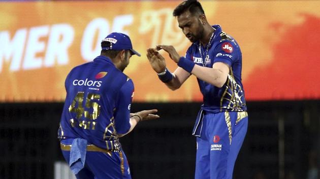 Krunal Pandya and Rohit Sharma of Mumbai Indians celebrates after taking the wicket of Kedar Jadhav. (AP) Krunal Pandya and Rohit Sharma of Mumbai Indians celebrates after taking the wicket of Kedar Jadhav. (AP)