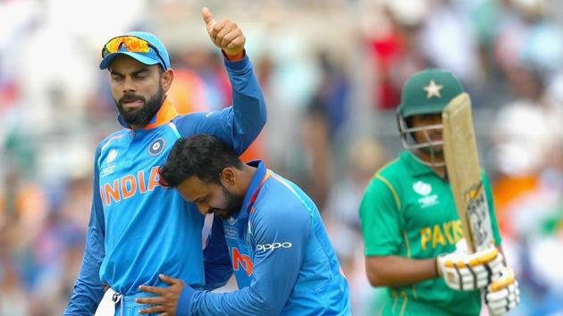 File image of India skipper Virat Kohli celebrating with Kedar Jadhav after the fall of a wicket.(Getty Images)