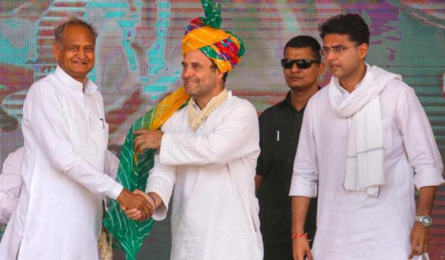 Congress President Rahul Gandhi with Rajasthan Chief Minister Ashok Gehlot and deputy Chief Minister Sachin Pilot at an election rally in the state.(PTI file photo)