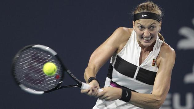 Petra Kvitova, of the Czech Republic, returns the ball to Ashleigh Barty, of Australia, during the Miami Open.(AP)