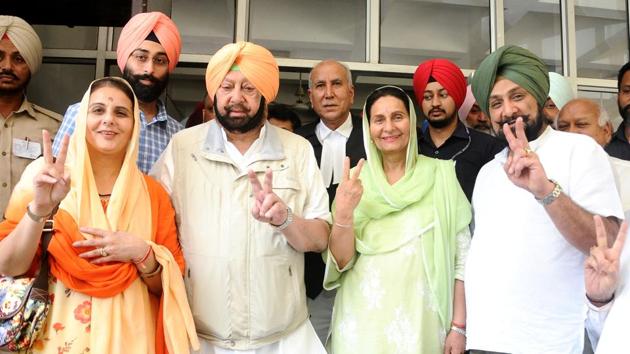 Congress candidate Preneet Kaur with her husband Punjab CM Captain Amarinder Singh, son Raninder Singh and daughter Jai inder Kaur and grandson Nirvan Singh after submitting the nomination papers in Patiala on Friday.(HT Photo)