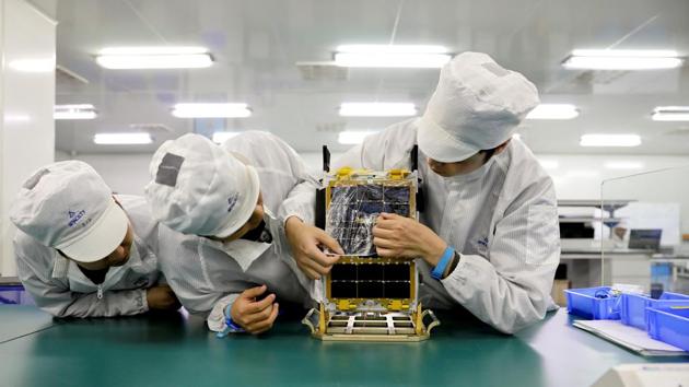 Engineers test Satellite TY3-12, which weighs 10 kilograms, at a lab of Spacety in Changsha, Hunan province. Demand for nanosatellites - which weigh less than 10 kilogrammes and are in some cases as small as a shoebox - is expected to explode in the next few years. And China’s rocket entrepreneurs reckon there is no better place to develop inexpensive launch vehicles than their home country. (Aly song / REUTERS)