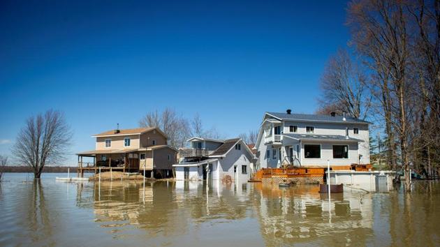 Floods in progress at Rigaud in the suburbs of Montreal, Quebec, Canada. (Sebastien St-Jean / AFP) Floods in progress at Rigaud in the suburbs of Montreal, Quebec, Canada. (Sebastien St-Jean / AFP)