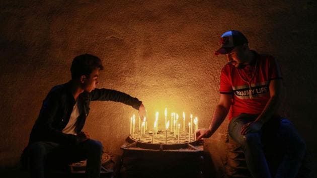 Muslim Shiite pilgrims light candles during the Shaabaniya ceremony commemorating the birth of the 12th Imam al-Mahdi, in the Iraqi holy city of Karbala. (Mohammed Sawaf / AFP) Muslim Shiite pilgrims light candles during the Shaabaniya ceremony commemorating the birth of the 12th Imam al-Mahdi, in the Iraqi holy city of Karbala. (Mohammed Sawaf / AFP)