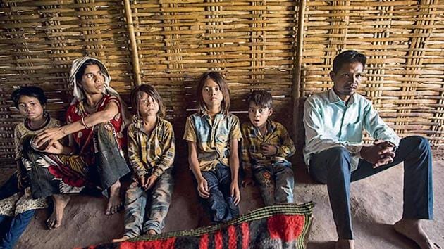 Vasant Bija Vasave’s is first name on the state's electoral list, but his village, Manibeli, has no roads or connectivity. (Pratik Chorge/HT) Vasant Bija Vasave’s is first name on the state's electoral list, but his village, Manibeli, has no roads or connectivity. (Pratik Chorge/HT)