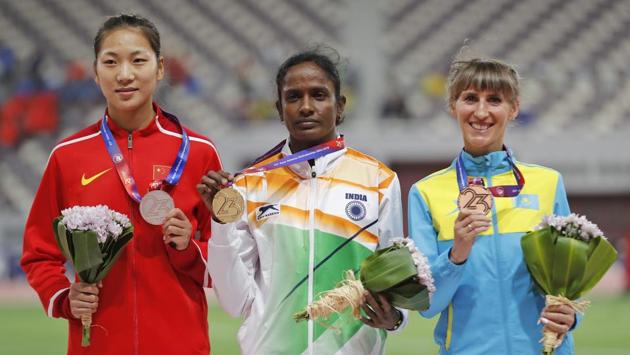(L-R) China’s Wang Chunyu, India’s Gomathi Marimuthu, and Kazakhstan’s Margarita Mukasheva display their silver, gold and bronze medals respectively for the women’s 800-meters race at the Asian Athletics Championships in Doha, Qatar. (PTI / AP) (L-R) China’s Wang Chunyu, India’s Gomathi Marimuthu, and Kazakhstan’s Margarita Mukasheva display their silver, gold and bronze medals respectively for the women’s 800-meters race at the Asian Athletics Championships in Doha, Qatar. (PTI / AP)