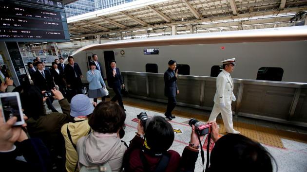 Shirataki and her friends photograph Japan's Crown Prince Naruhito, Crown Princess Masako and their daughter Princess Aiko at Tokyo Station. “I wasn’t used to carrying such a heavy camera, so I’d shoot the tyres, or the back seat, or the driver,” Shirataki said in the kitchen of her home in Kawasaki, near Tokyo, decorated with a photo of Masako and an Imperial Family calendar. (Issei Kato / REUTERS) Shirataki and her friends photograph Japan's Crown Prince Naruhito, Crown Princess Masako and their daughter Princess Aiko at Tokyo Station. “I wasn’t used to carrying such a heavy camera, so I’d shoot the tyres, or the back seat, or the driver,” Shirataki said in the kitchen of her home in Kawasaki, near Tokyo, decorated with a photo of Masako and an Imperial Family calendar. (Issei Kato / REUTERS)