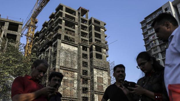 Lalit Vazirani (not pictured), a computer programmer from Mumbai, never reckoned on having to turn amateur property developer. Yet here he is, a decade after putting down a deposit for an apartment near the city’s airport, dealing with architects, taxes, various planning permissions and even court hearings. All because the developer has gone bust, and nobody else has stepped in to finish the work. (Dhiraj Singh / Bloomberg)
