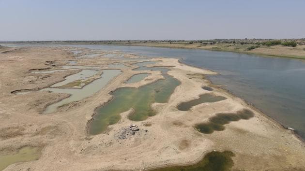 Patches left by illegal sand mining activity seen along the banks of Chambal river in Morena district of Madhya Pradesh. (Burhaan Kinu / HT Photo) Patches left by illegal sand mining activity seen along the banks of Chambal river in Morena district of Madhya Pradesh. (Burhaan Kinu / HT Photo)