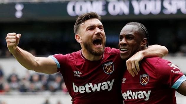 West Ham's Michail Antonio celebrates scoring their first goal with Robert Snodgrass.(Action Images via Reuters)