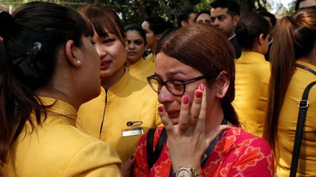 An employee of Jet Airways is consoled by her colleagues during a protest demanding to “save Jet Airways” in New Delhi. (Adnan Abidi / REUTERS) An employee of Jet Airways is consoled by her colleagues during a protest demanding to “save Jet Airways” in New Delhi. (Adnan Abidi / REUTERS)