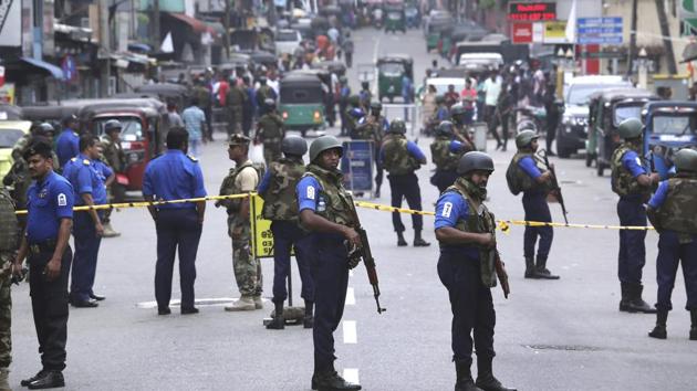Sri Lankan Naval soldiers stand guard as authorities started clearing the debris from inside of the damaged St. Anthony's Church after it was targeted in a series of Islamic State-claimed suicide bombings that killed hundreds of people during Easter Sunday. (AP Photo) Sri Lankan Naval soldiers stand guard as authorities started clearing the debris from inside of the damaged St. Anthony's Church after it was targeted in a series of Islamic State-claimed suicide bombings that killed hundreds of people during Easter Sunday. (AP Photo)