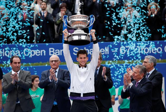 Austria's Dominic Thiem celebrates with the trophy after winning the Barcelona Open. (REUTERS) Austria's Dominic Thiem celebrates with the trophy after winning the Barcelona Open. (REUTERS)