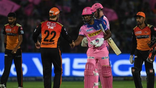 Rajasthan Royals’ Sanju Samson (2nd R) shakes hand with Sunrisers Hyderabad captain Kane Williamson at the end of their IPL match. (AFP)