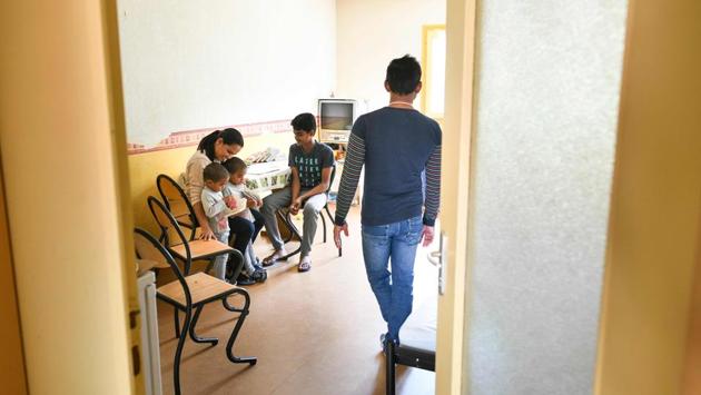 The huge apartments once occupied by gendarmes host large families. The children are taught in a specially-created class at the school in Ferrette which they walk to every day, bringing youthful voices to the village streets. Inside a split-level apartment with faded yellow walls, a newly arrived Sri Lankan family with a 14-year-old boy and three-year-old twins shares the kitchen with an Armenian woman and her 17-year-old son. (Sebastien Bozon / AFP) 