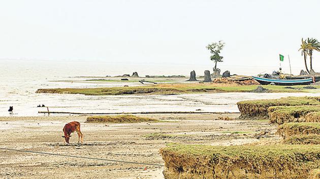 Roughly half of the Ghoramara island has disappeared over the past 30 years, with rising water levels in the local river, Muriganga, and the Bay of Bengal hastening its erosion. (Indranil Bhoumik/Mint Archive) Roughly half of the Ghoramara island has disappeared over the past 30 years, with rising water levels in the local river, Muriganga, and the Bay of Bengal hastening its erosion. (Indranil Bhoumik/Mint Archive)