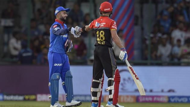 Delhi Capitals wicket-keeper Rishabh Pant and Royal Challengers Bangalore batsman Virat Kohli. (PTI)