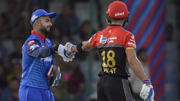 Delhi Capitals wicket-keeper Rishabh Pant and Royal Challengers Bangalore batsman Virat Kohli.(PTI)