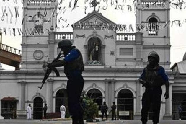 Security personnel stand guard in front of St. Anthony's Shrine in Colombo on April 23, 2019, two days after a series of bomb blasts targeting churches and luxury hotels in Sri Lanka.(AFP)